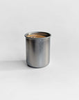 Tetsu Cup, stonewashed stainless steel cup filled with coffee
