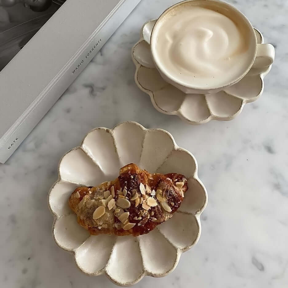 Handmade Rinka Plate by Kaneko Kohyo with coffee and pastry, showcasing unique glaze texture, Japan-made, microwave safe.