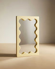 Cream White Onda Wave Mirror, front view