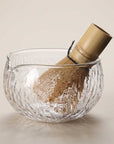 Hand-textured glass matcha bowl with bamboo whisk, clear finish
