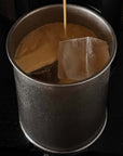 Tetsu Cup filled with iced coffee, close-up of the stonewashed texture