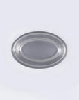 Vintage INOX oval stainless steel plate with chic design, durable and versatile for various uses.
