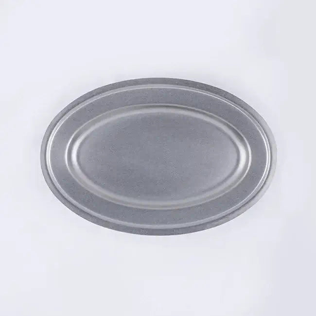 Vintage INOX oval plate made of durable 18-8 stainless steel, showcasing a chic and versatile design for various uses.
