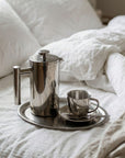 Morning Coffee Set oval tray with French press and cup on white linen