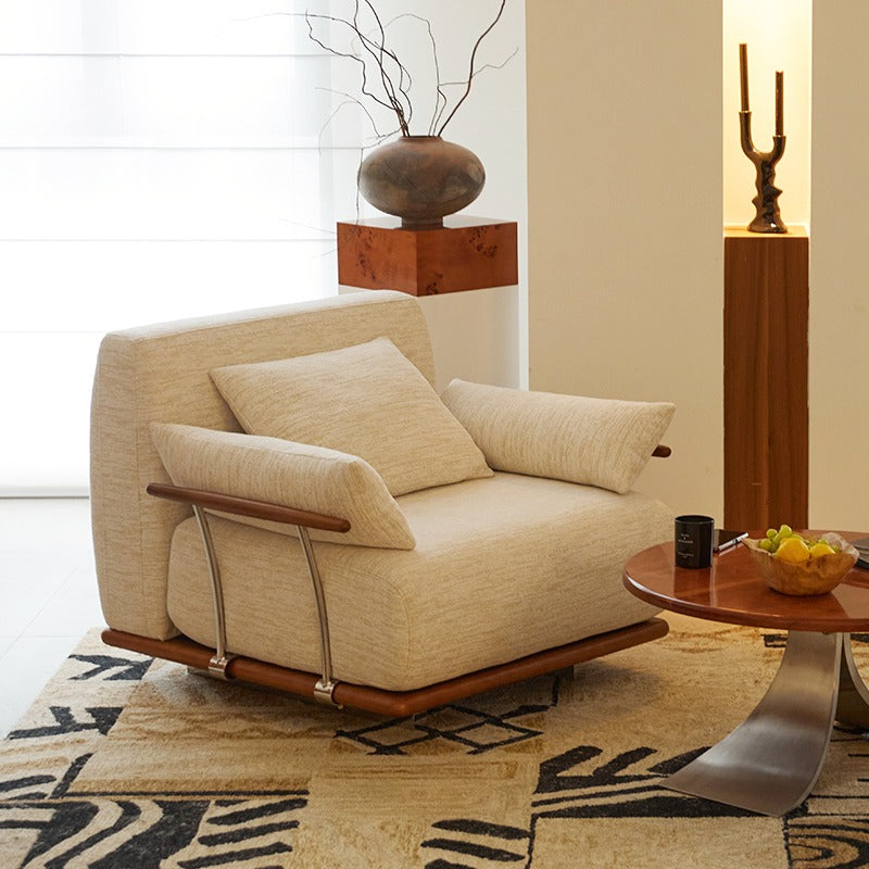 Cozy Nozomi Banca Sofa in beige with plush pillows, featuring modern design from LoveÉcru. Ideal for stylish, comfortable living spaces.