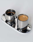 Kyoto Set with two stainless steel cups on a sleek tray, featuring a mirror finish, from LoveÉcru.