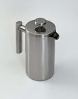 Stainless steel French press coffee pot with double-layer insulation and mirror finish for optimal heat retention.