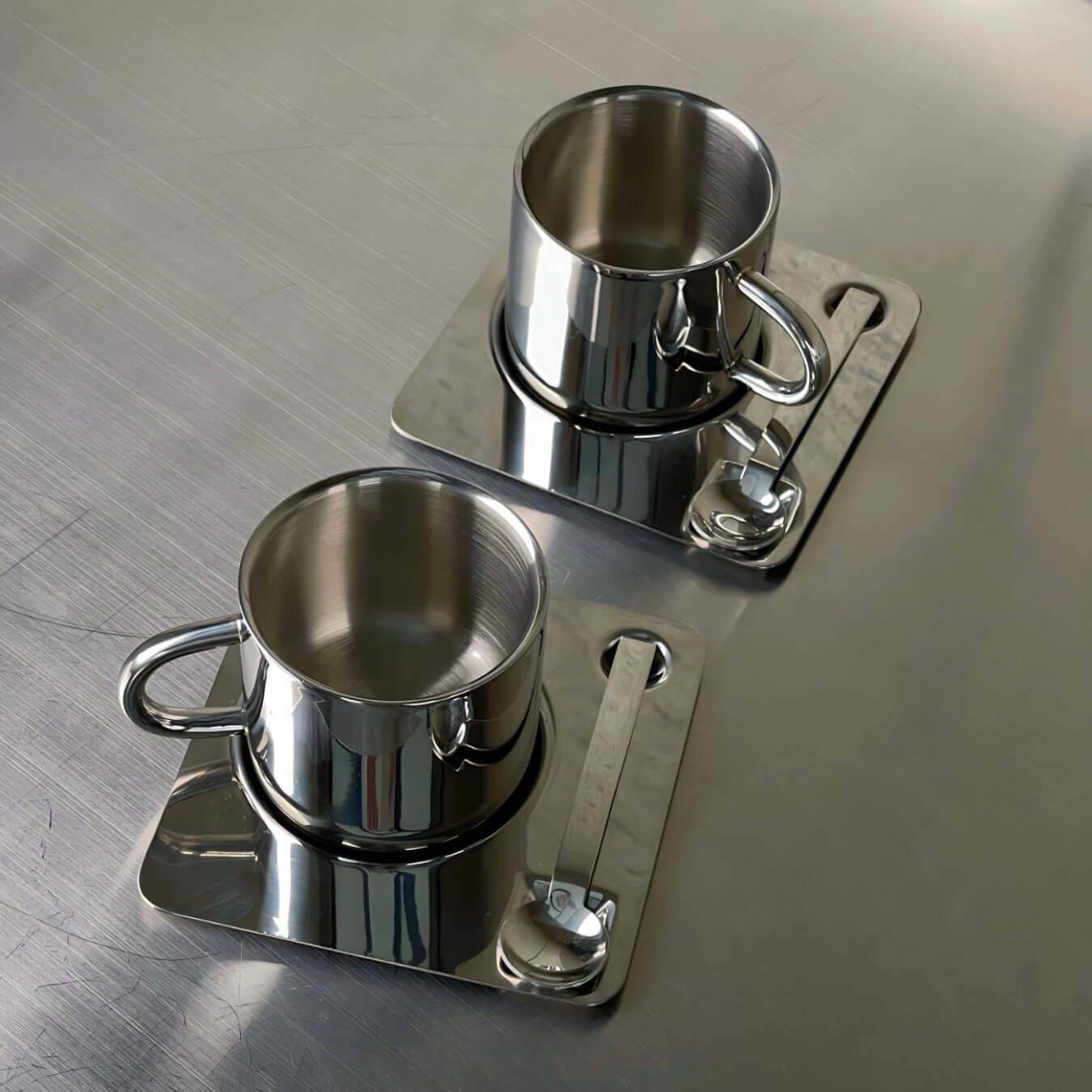 Venice Mirror Cup Set with Saucer & Spoon, featuring polished mirror finish for a timeless and elegant coffee experience.
