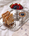 Breakfast Bundle: Signature tray with toast rack, dessert stand with berries and the café napkin
