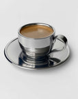 Luna Mirror Cup 200ml — mirror-polished stainless steel cup and saucer by LoveÉcru