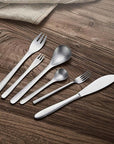 Kyoto Cutlery Set laid out on a dark wooden table
