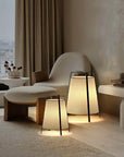 Wabi-Sabi fabric floor lamps with iron sockets, adding elegance and tranquility to a modern interior inspired by Japanese aesthetics.