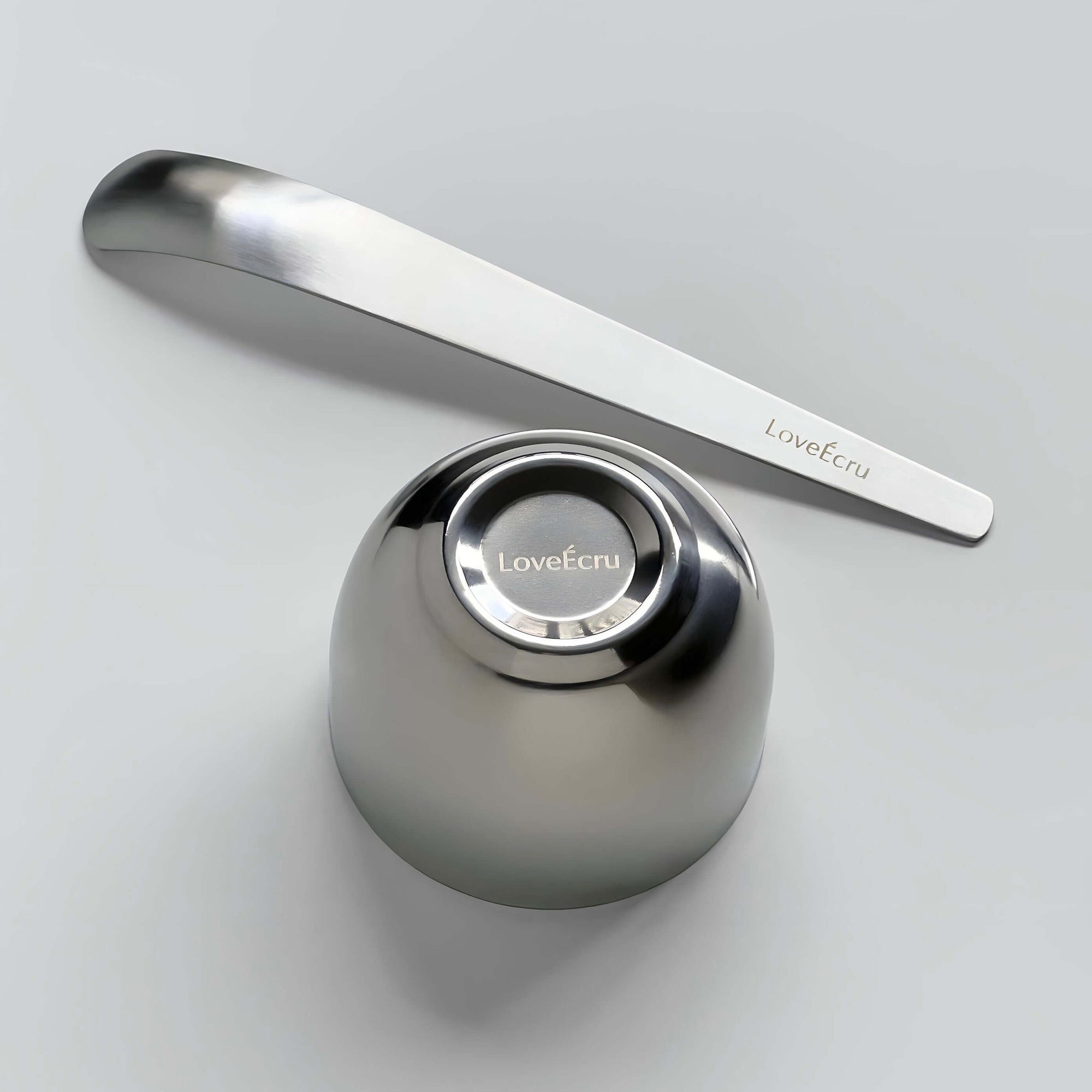 Stainless steel bowl and spoon set by LoveEcru for modern dining elegance