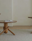 Clown Table in three sizes showcasing playful building block-inspired design in a minimalist room setting.