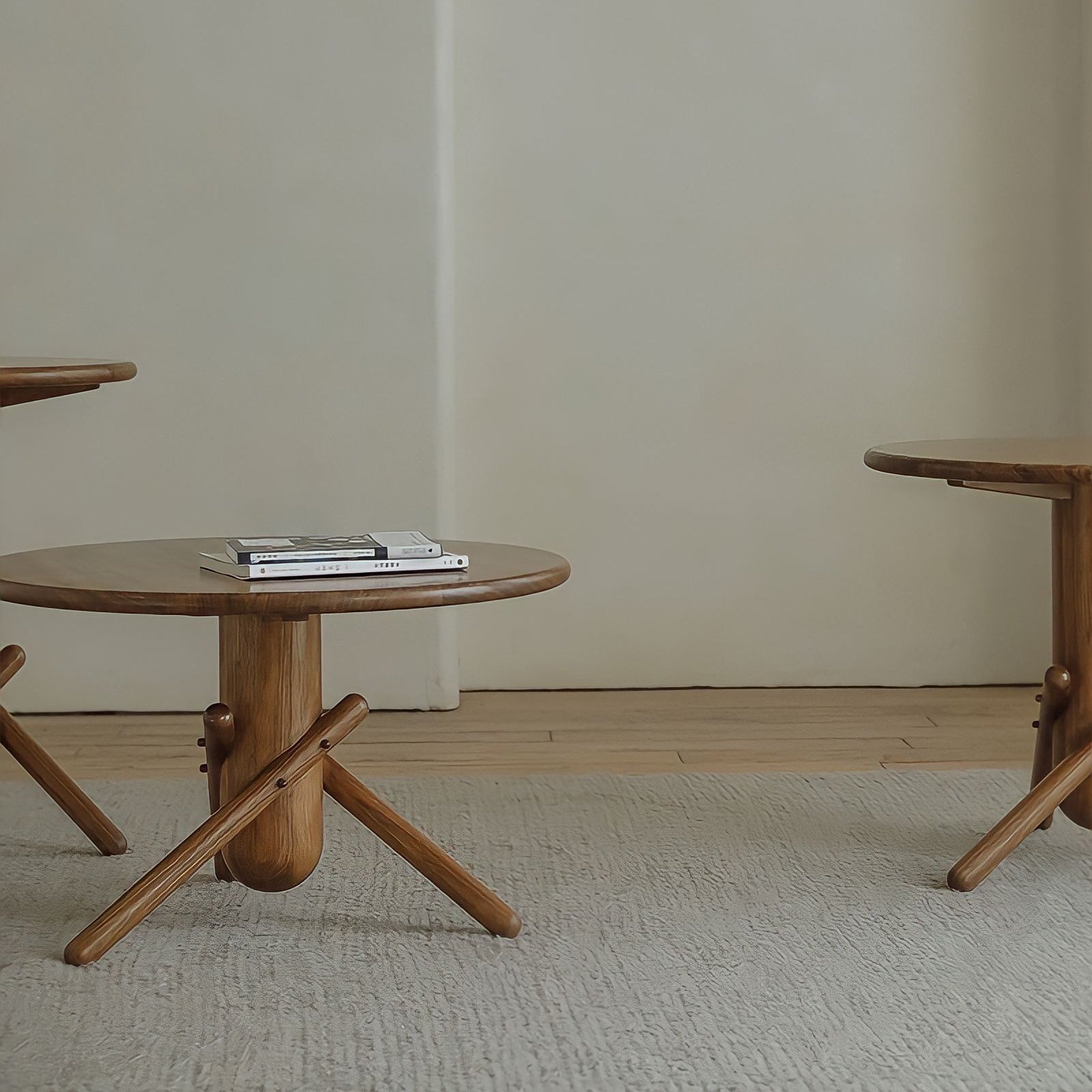 Clown Table in three sizes showcasing playful building block-inspired design in a minimalist room setting.