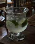 Lune Sculptural Goblet filled with iced matcha and ice