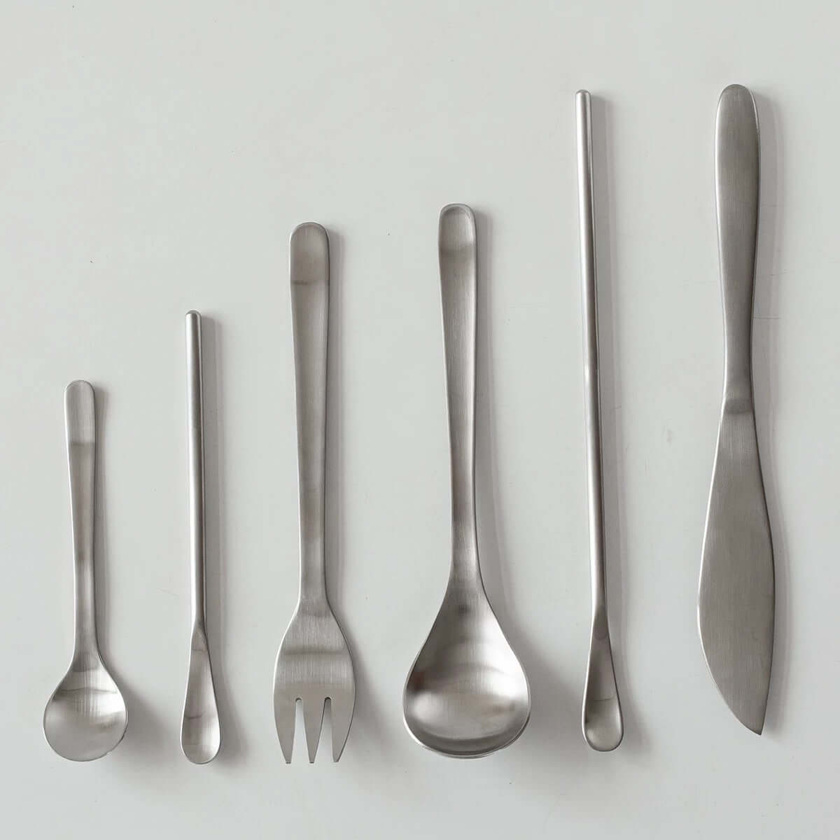 Japanese retro stainless steel cutlery set, includes 6 modern utensils with sleek, durable design for an elevated dining experience.