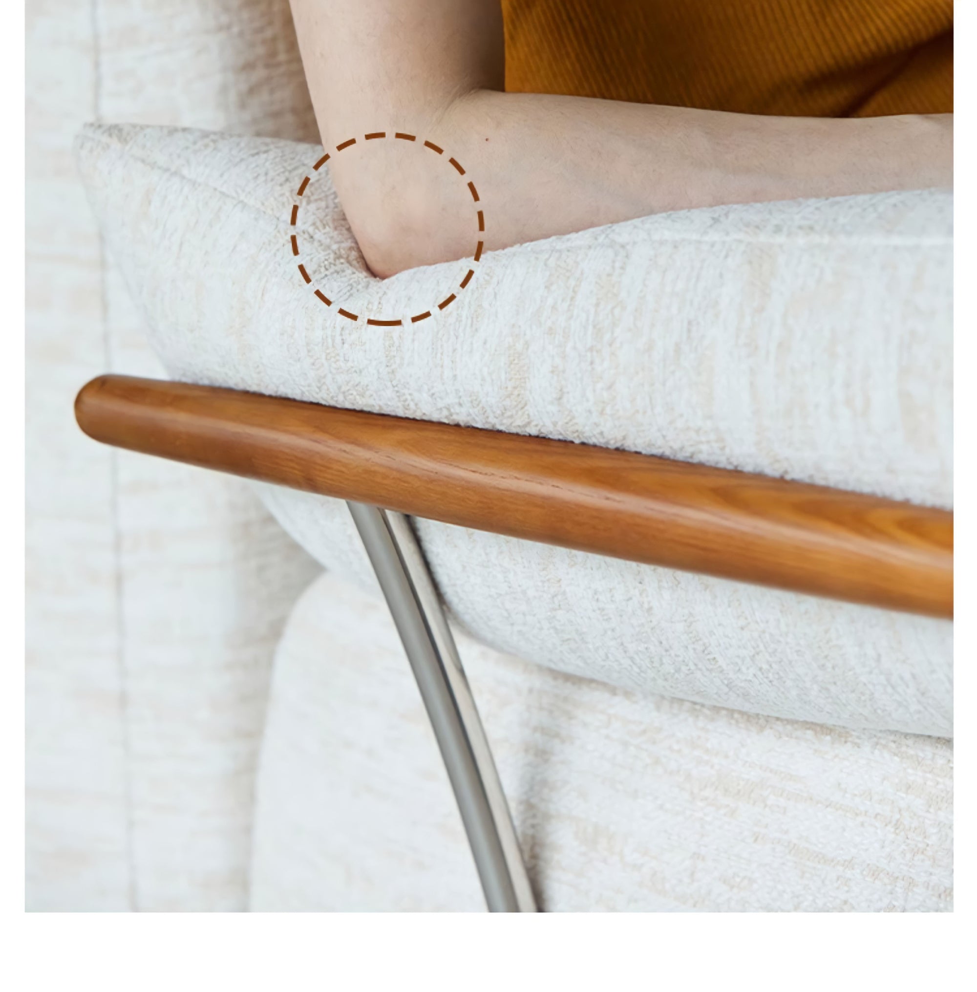 Close-up of arm resting on cushioned Nozomi Banca Sofa with wooden frame, highlighting comfort and design details.