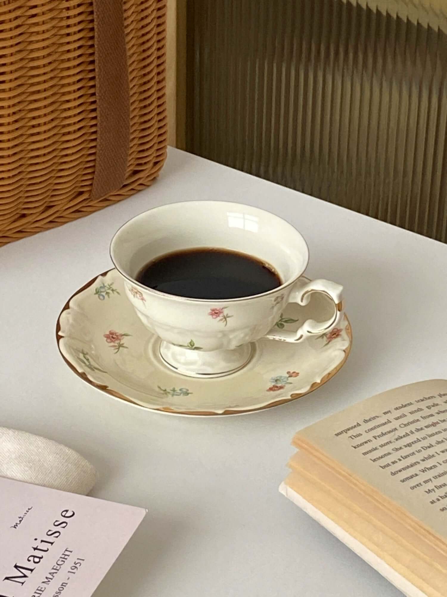 Retro French Blossom Cup & Saucer Set with Coffee on Table