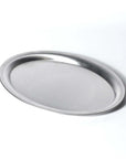 Stainless steel plate with matte finish, part of exclusive collection, perfect for everyday meals and special occasions. Durable and BPA-free.