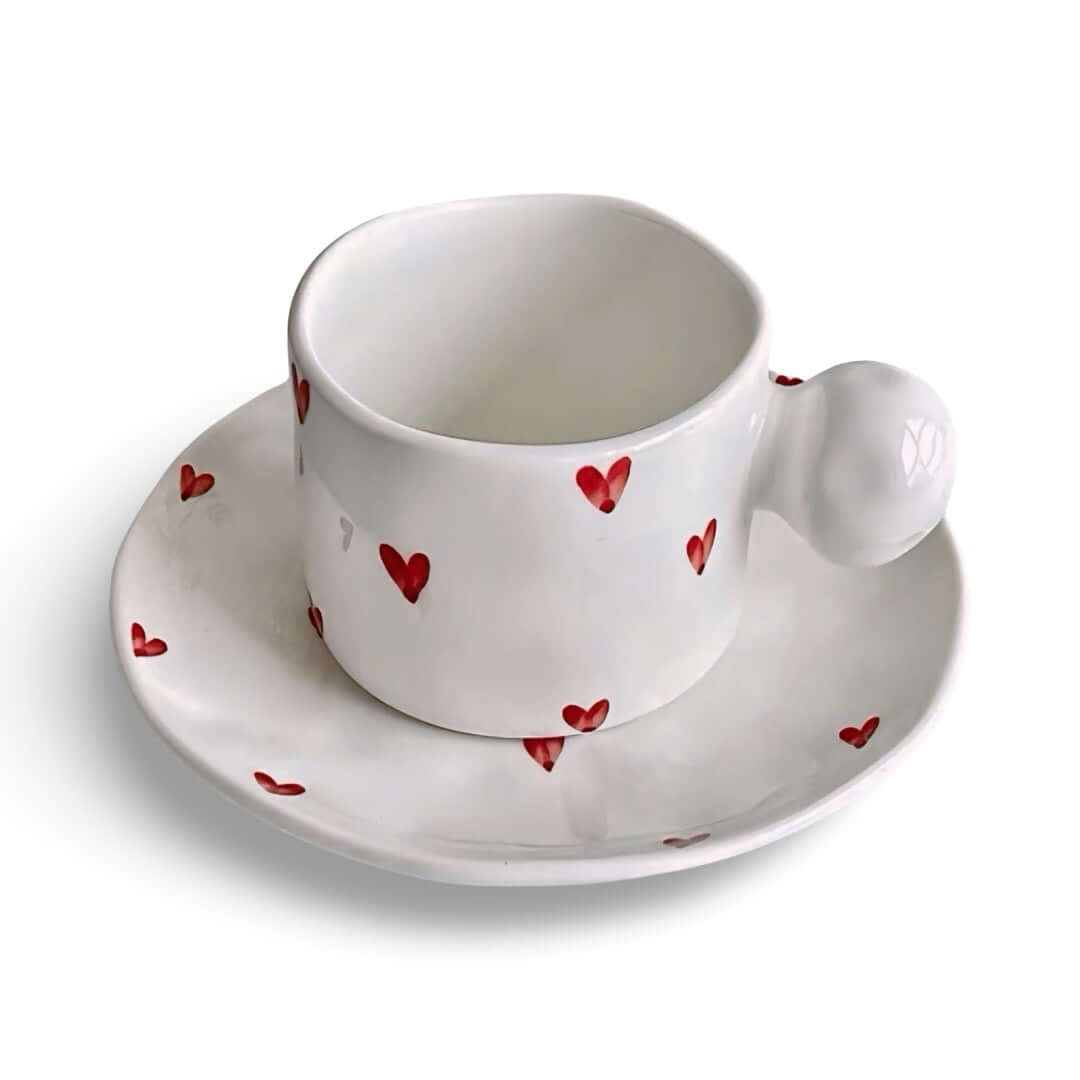 Love Bubble Mug & Saucer with red heart design, 250ml capacity, cup dimensions H6.6cmxD8.5cm, saucer 16cm diameter.
