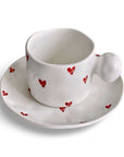 Love Bubble Mug & Saucer with red heart design, 250ml capacity, cup dimensions H6.6cmxD8.5cm, saucer 16cm diameter.