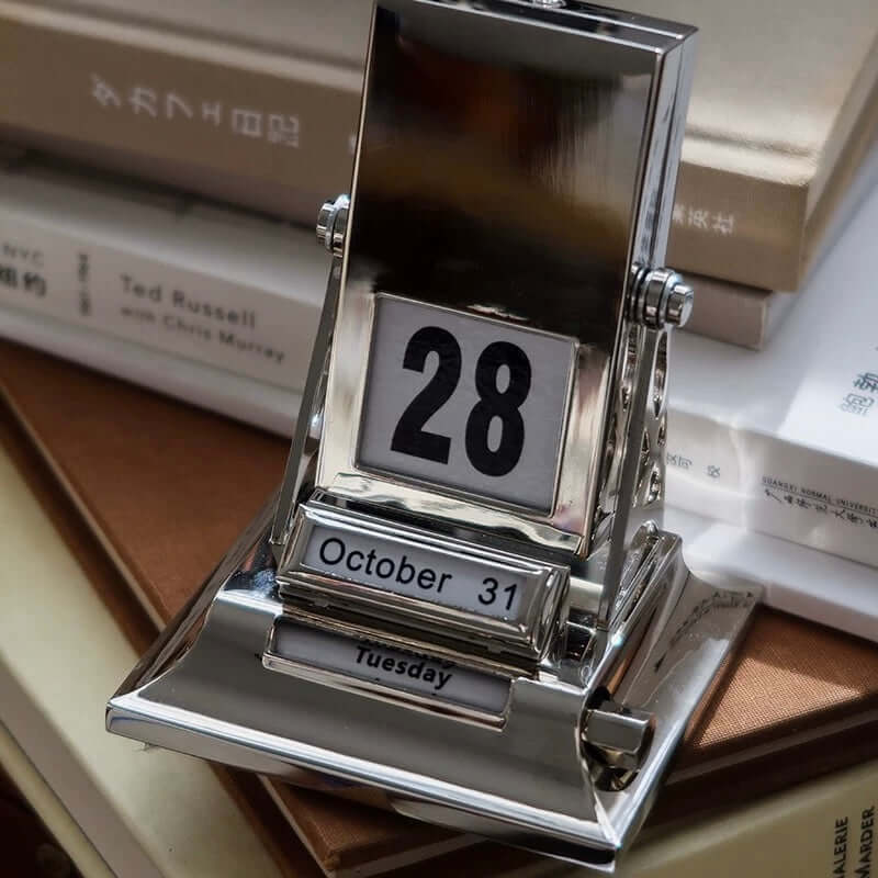 Timeless Rotating Desk Date Keeper displaying October 28, elegant design with minimalist appeal, perfect for stylish date tracking.