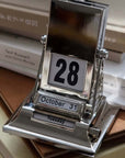 Timeless Rotating Desk Date Keeper displaying October 28, elegant design with minimalist appeal, perfect for stylish date tracking.