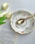 Retro French blossom saucer and spoon set with floral design, Chic de Fleurs.