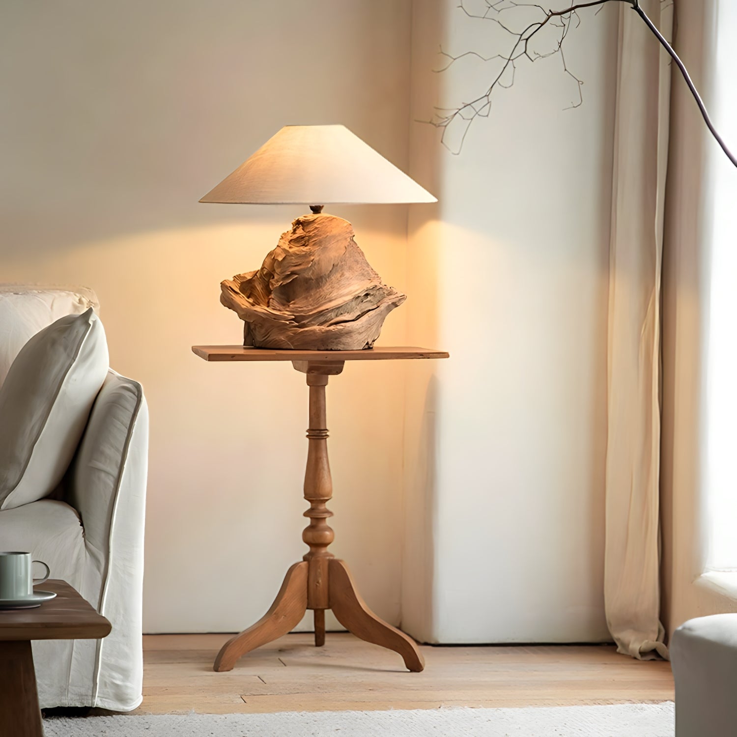 Custom-crafted wooden lamp on a wooden side table in cozy living room setting.