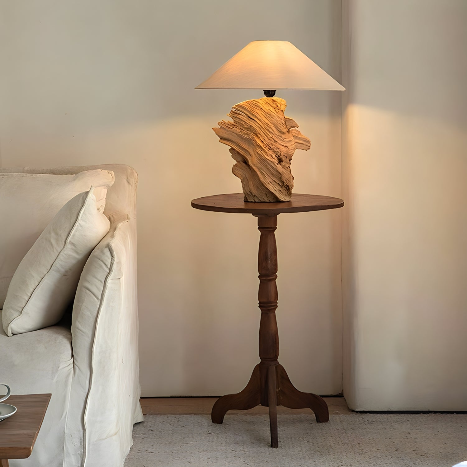 Custom-crafted wooden lamp on round table, illuminating cozy living space. Unique design available at Loveecru. Contact for inquiries.