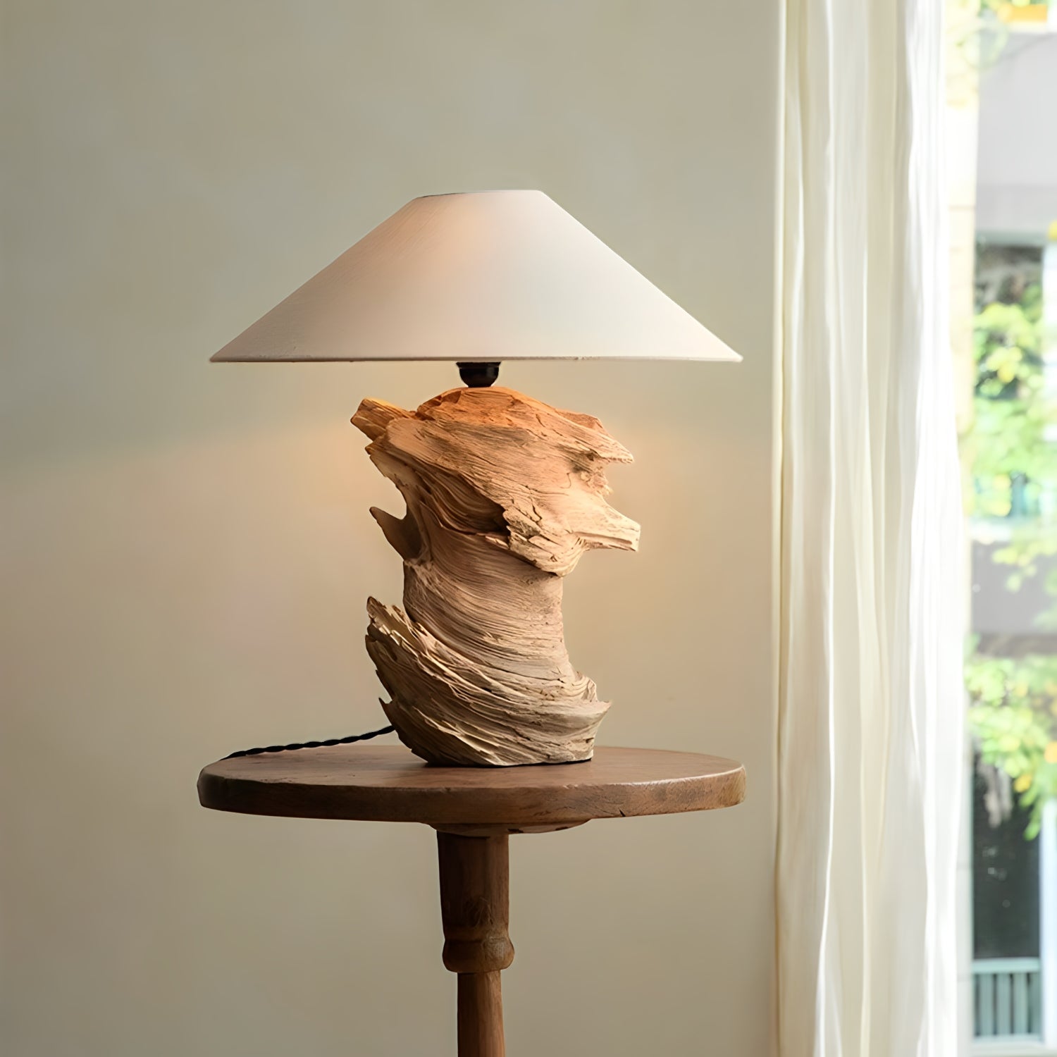 Unique custom-crafted wooden lamp on a round table near a window, showcasing artistic design with a natural wood finish.