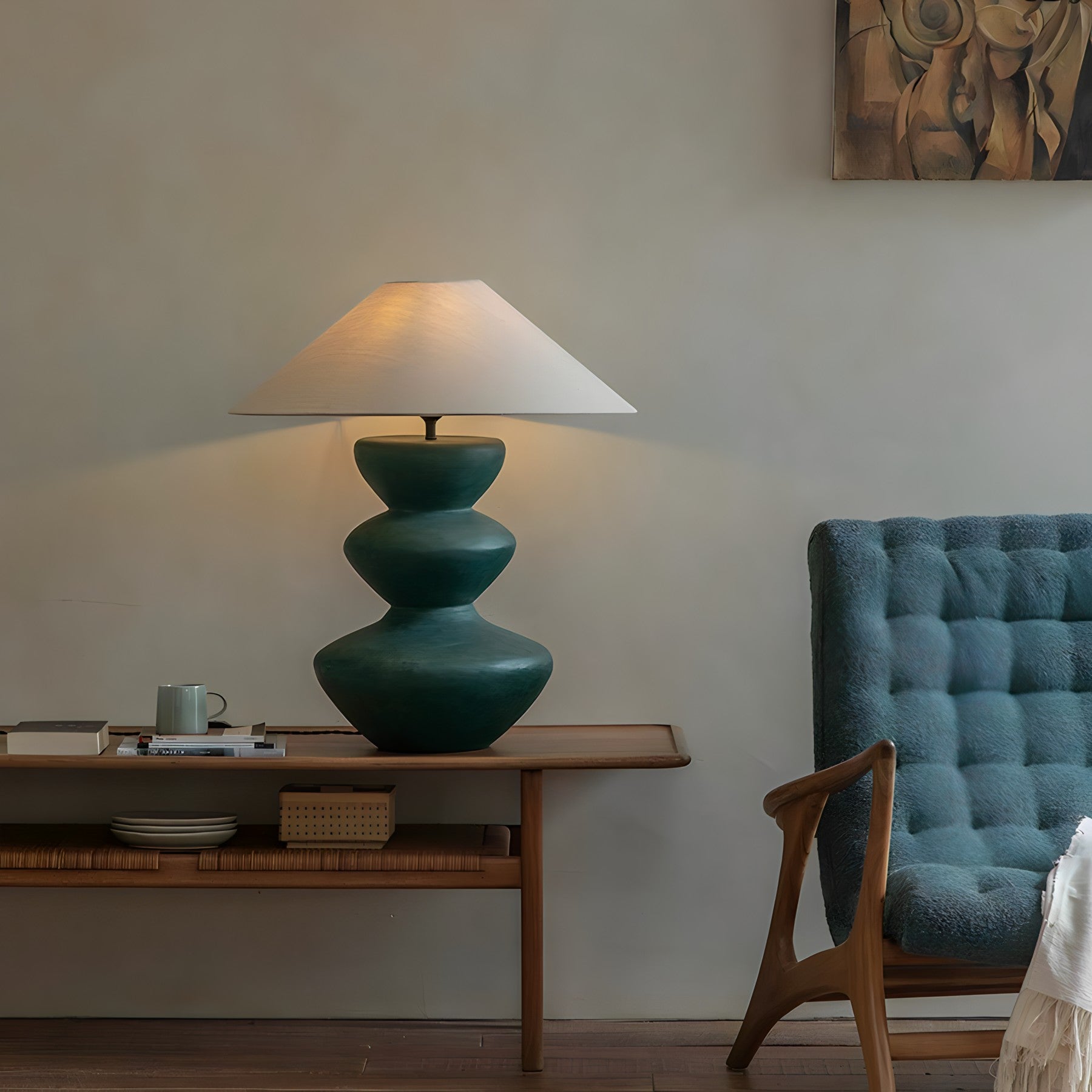 Elegant ceramic pot table lamp with linen shade on modern wooden side table, accentuating cozy living room decor.