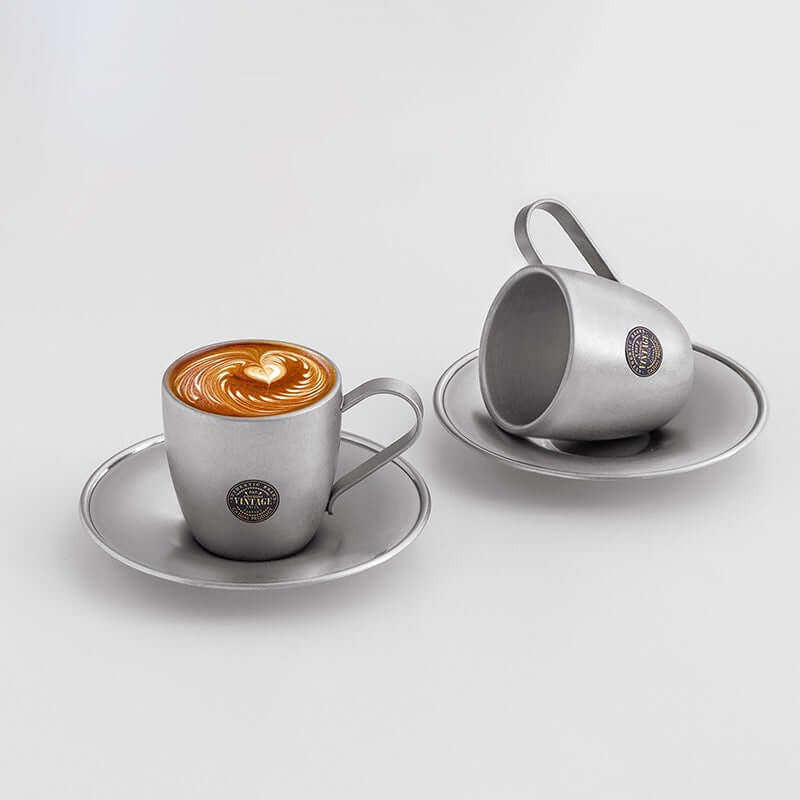 Vintage INOX stainless steel cup and saucer set with latte art, elegant design, made in Japan, recommended for handwashing.