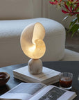 Nautilus Table Lamp — spiral shell-shaped translucent lamp by LoveÉcru