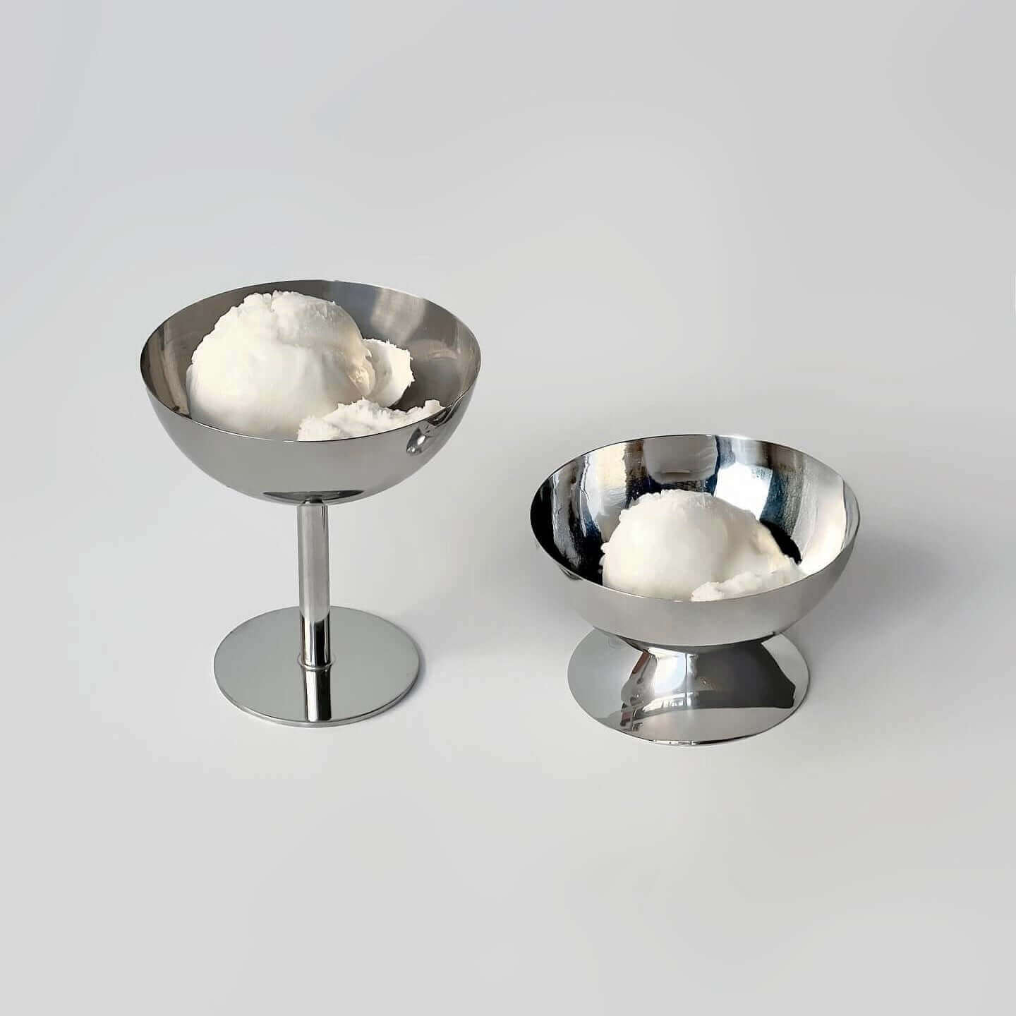 Stylish stainless steel ice cream bowls showcasing a refined dessert experience with creamy scoop.