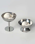 Stylish stainless steel ice cream bowls showcasing a refined dessert experience with creamy scoop.