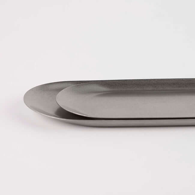 Stainless steel vintage INOX oval trays, showcasing elegant and durable design, perfect for various uses, made in Japan.
