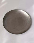 Matte-finished stainless steel Hakone Plate showcasing minimalist design and texture for elegant dining.