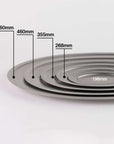 Five stacked VINTAGE INOX oval plates of varying sizes, made from durable stainless steel, showcasing design and dimensions.
