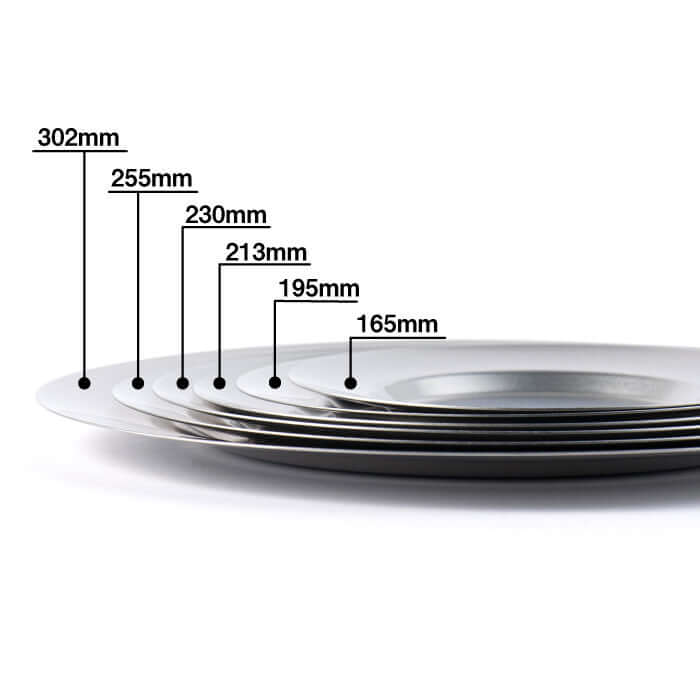 Stack of VINTAGE INOX stainless steel round plates in various sizes from 165mm to 302mm, showcasing durable and chic design.