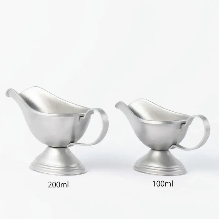 Stainless steel VINTAGE INOX sauce pots, 200ml and 100ml sizes, elegant design, made in Japan, suitable for various occasions.