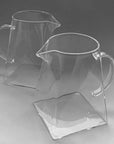 Two Aeris Frosted Glass Pitchers side by side