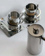 Stainless steel coffee set with Italian style cups and modern design elements.