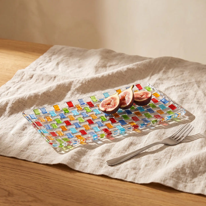 Tessera rectangular platter with halved figs and a fork on a linen tablecloth