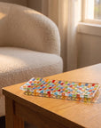 Tessera rectangular platter on an oak console beside an armchair