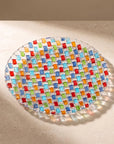 Tessera hand-painted mosaic plate 23.5 cm showing woven texture in sunlight