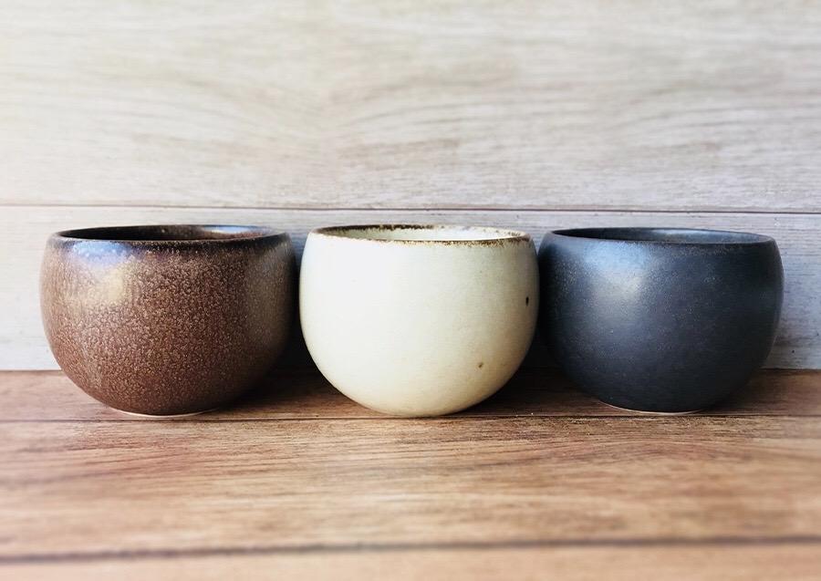 Rila Tea Cups by Kaneko Kohyo; set of three textured, matte cups in brown, white, and grey, perfect for tea, desserts, and single-serve dishes.