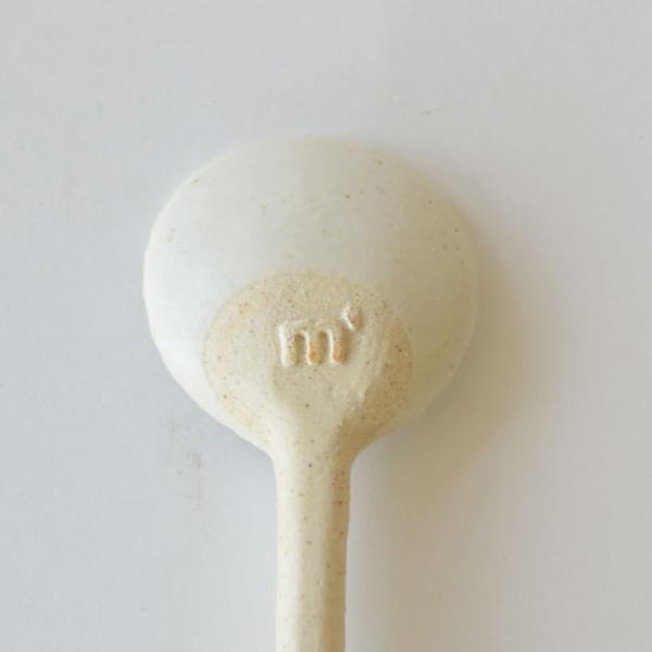 Marumitsu Bean Spoon with rustic semi-matte finish and bean-shaped tip showing unique glaze design on white clay.
