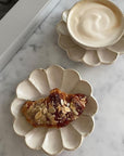 Elegant Rinka plate set with a croissant and coffee, showcasing Kaneko Kohyo's Japanese craftsmanship on a marble surface.